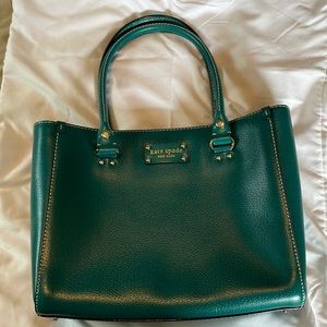 Kate Spade purse in bluish green.